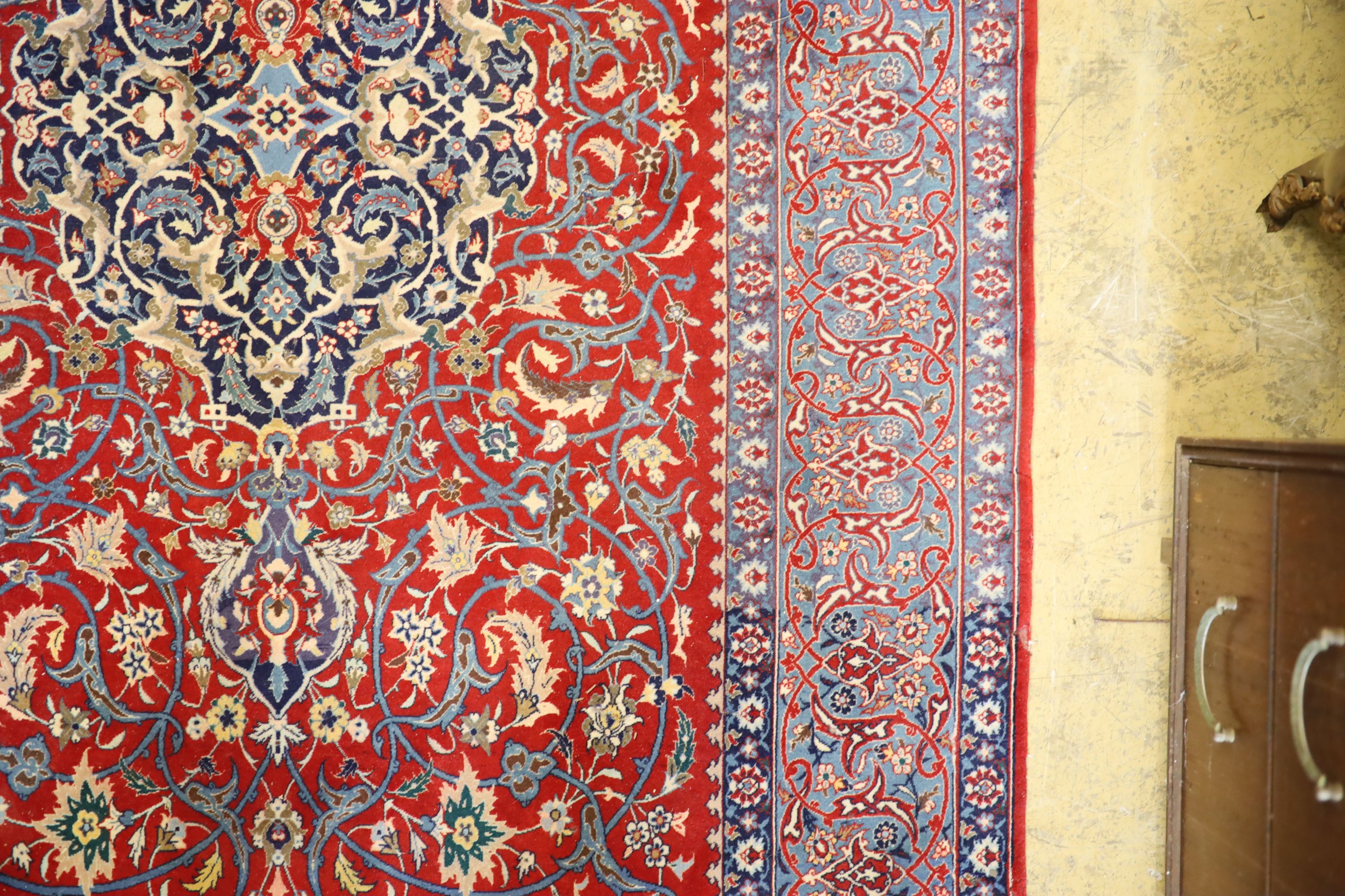 An Isfahan red ground rug, 169 x 110cm